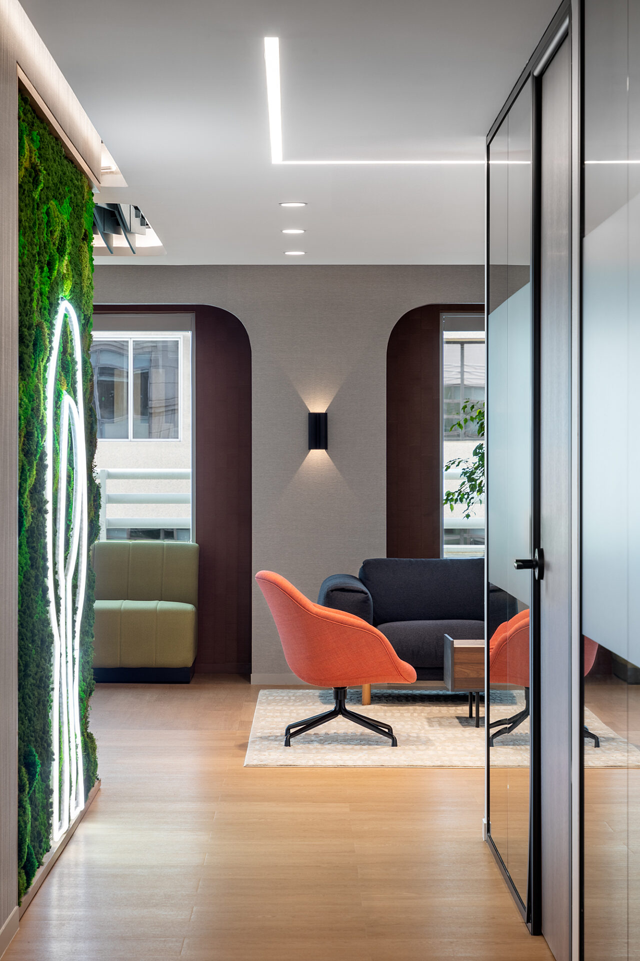 interior shot of private meeting space with focus on orange chair